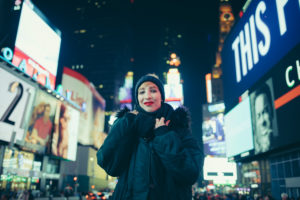 Blonde short hair girl on times square Blonde short hair girl on times square
